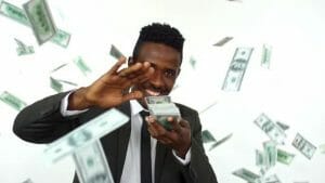 MBU image of succcessful business man with lots of money