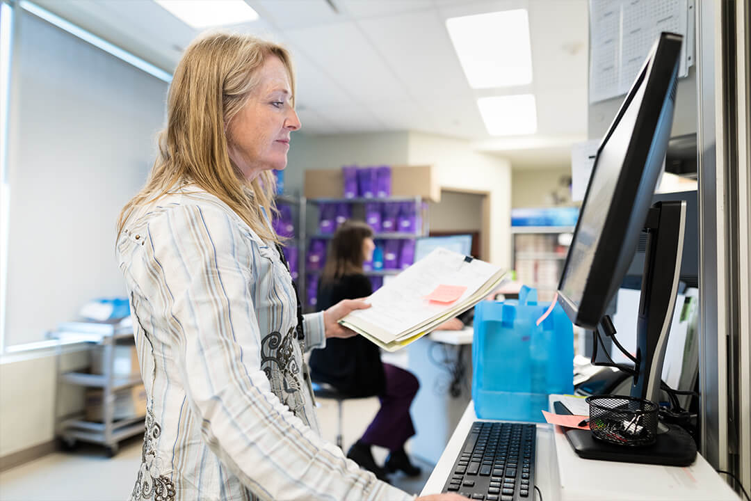 Man using scanner in warehouse environment